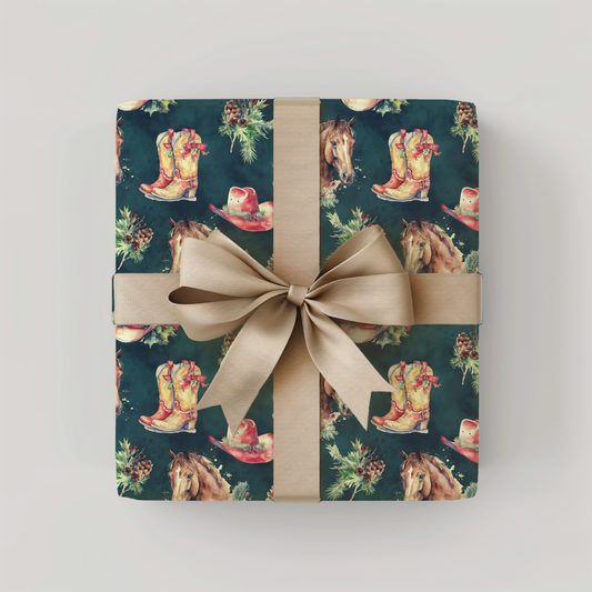 Gift box with cowboy boot and horse pattern wrapped in green paper with a beige ribbon on a light gray background