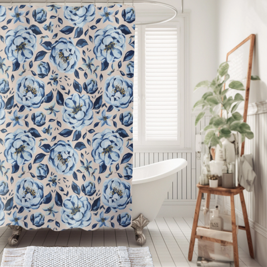 Bathroom with a floral shower curtain, white bathtub, and wooden stool with plants.