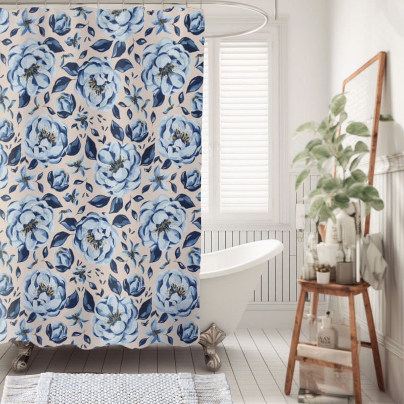 Bathroom with a floral shower curtain, white bathtub, and wooden stool with plants.
