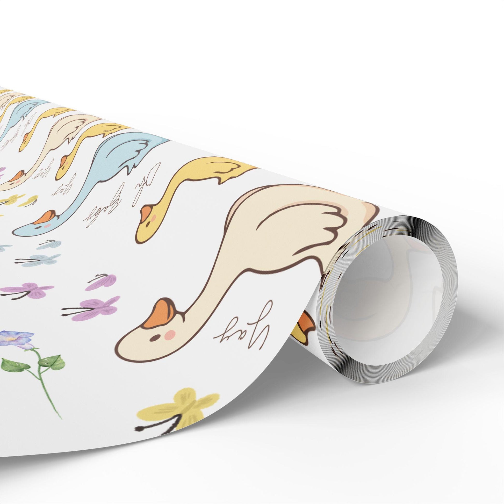 Cute duck baby shower wrapping paper with pastel ducklings and flowers wrapped around gift boxes